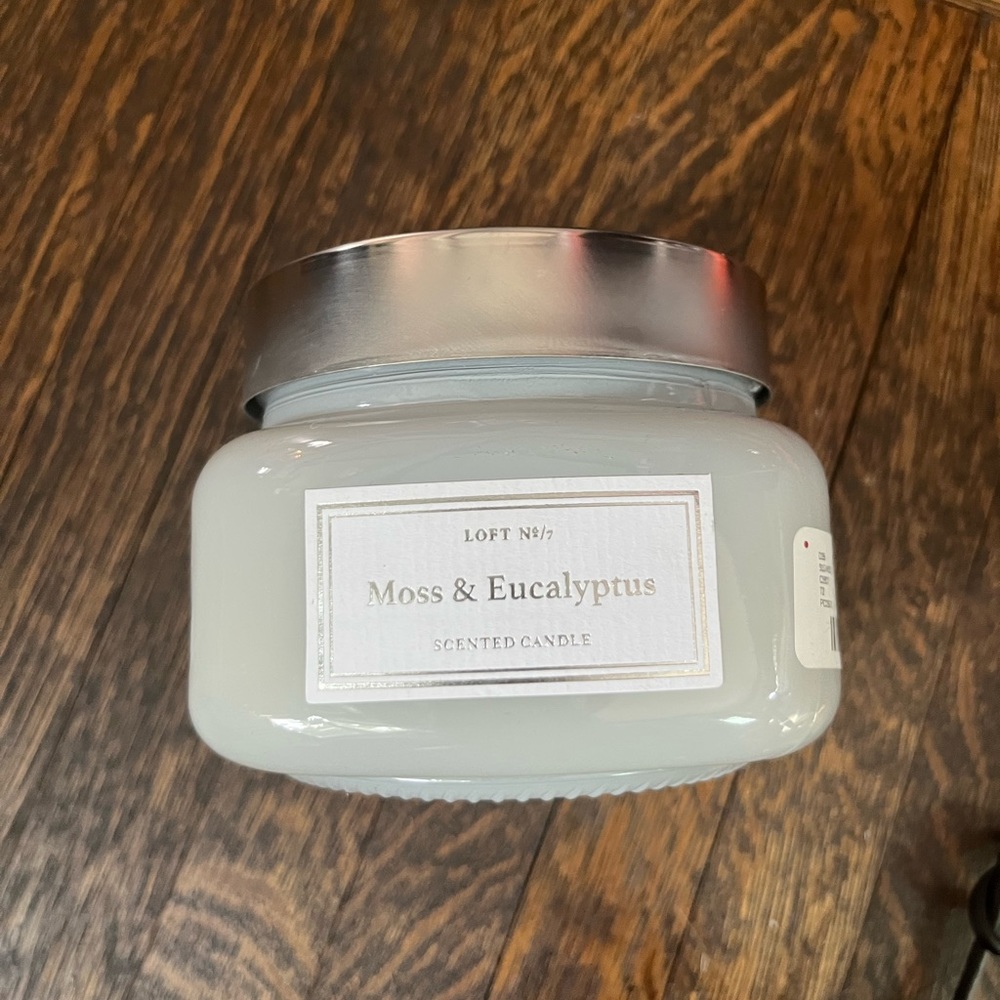 Unused moss and eucalyptus jar candle